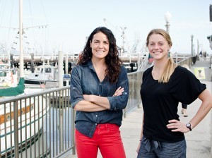 Norah Eddy, left, and Laura Johnson are founders of Salty Girl Seafood. The startup, spun out of the UC Santa Barbara Bren School of Environmental Science and Management, aims to make it easier for restaurants to source seafood directly from fishermen. (Alex Drysdale / Business Times photo)