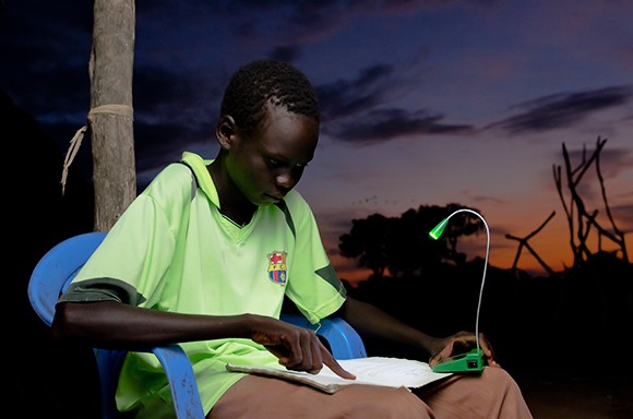 Goleta-based Unite to Light sells solar-powered lamps and cell-phone chargers that were designed at the Institute for Energy Efficiency at UC Santa Barbara. For each product the group sells, it donates one to a person in the developing world. (photo courtesy of Unite to Light)