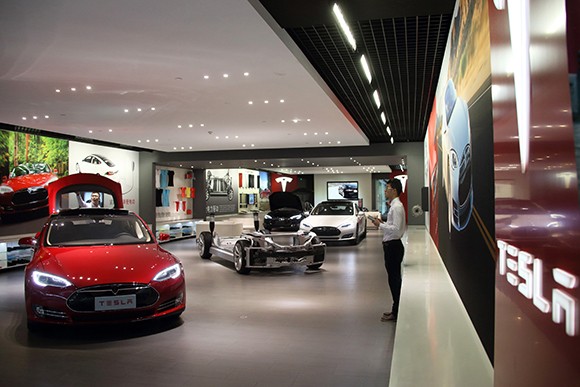 A Tesla Motors Model S electric vehicle stands on display at the company’s showroom in Beijing, China. (Bloomberg News photo)