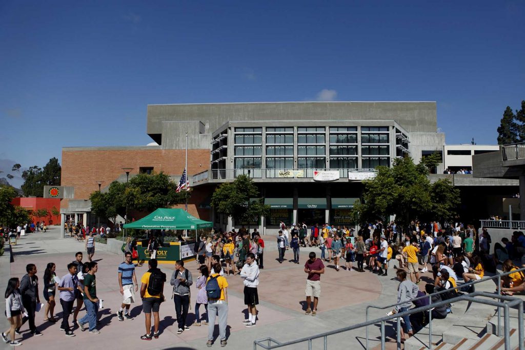 Students on the campus of California Polytechnic State University San Luis Obispo (Cal Poly SLO) in San Luis Obispo, California, U.S., on Friday, September 20, 2013. Photographer: Patrick T. Fallon/Bloomberg