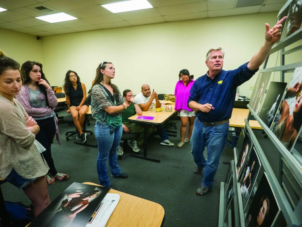 Tim Meyer critiques student work in his "Lighting People" class at Brooks Institute in Ventura.